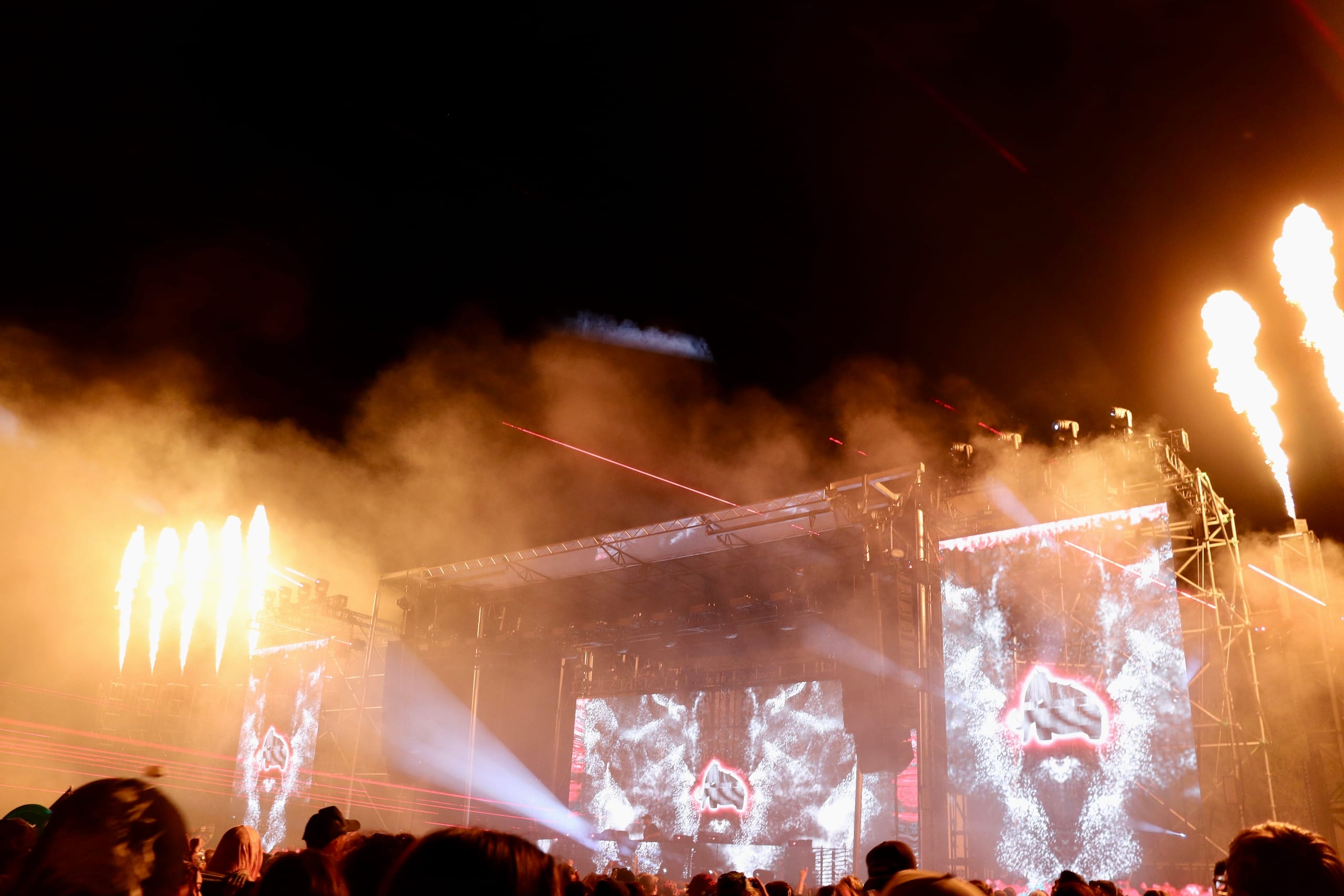 Far shot of Wooli on stage at Rawhide with lights and a massive Arizona crowd during his mammoth bass performance.