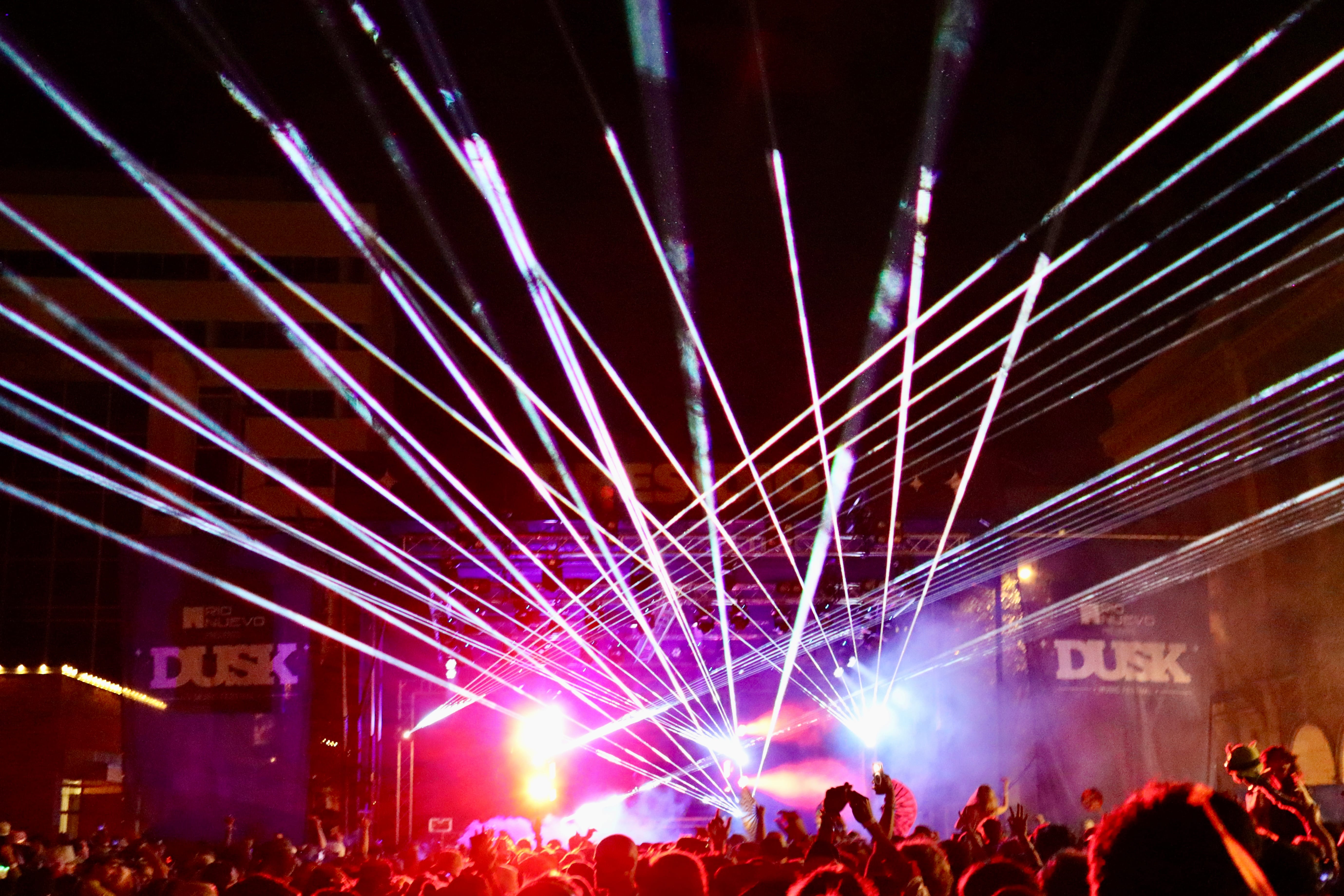 INZO laser show from back of crowd at DUSK